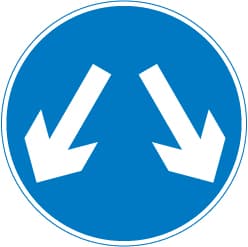 Vehicular traffic may reach the same destination by passing either side of the sign