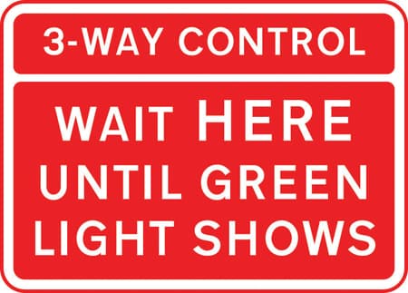 Vehicles may not pass the temporary traffic signals when the red light is shown at a junction